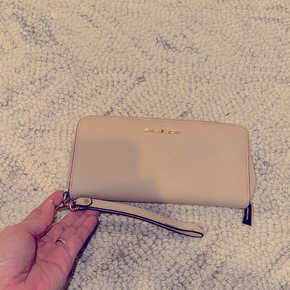 Michael Kors wristlet. Tan color.
